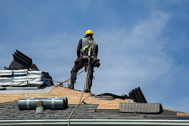 Professional Roofing technician working in Middlebury, VT